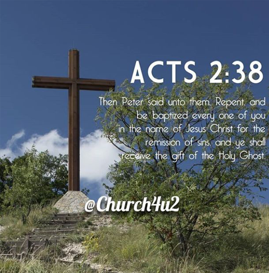 A blue summer sky at the top of a green hill with a cross supported by a pile of cemented stone. To the left is the Acts 2-38 and its quote.