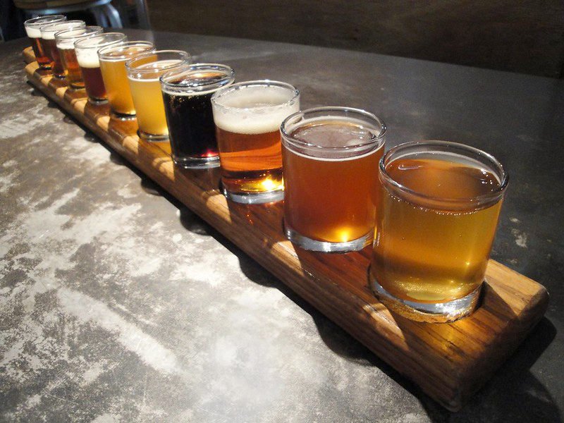 A row of ten glasses of brew from the Portsmouth Brewery