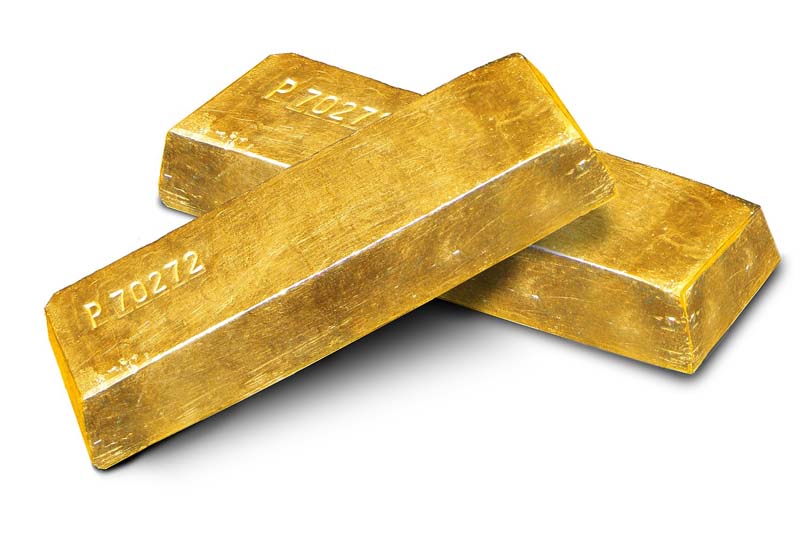 Gold bars stacked on white background