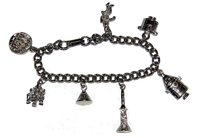 A silver charm bracelet with assorted space charms