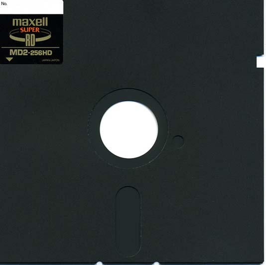 An old floppy disk, the one with the hole in the middle.