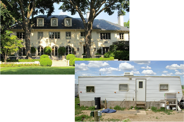 A large white house with a lot of windows set under huge trees with a green lawn in the upper left and the lower right is a battered trailer set on bare ground.