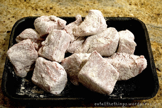 A plate of beef cubes dredged with flour