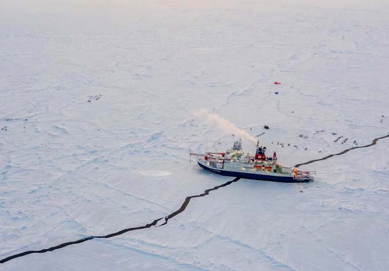 A lead running beneath Polarstern and through the MOSAiC floe, captured from a drone.