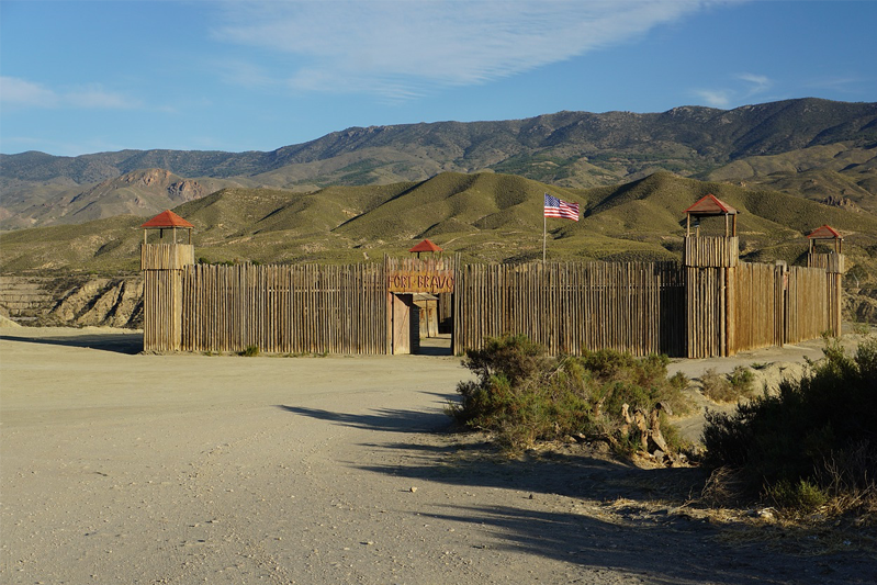 An Old West fort with a wooden stockade