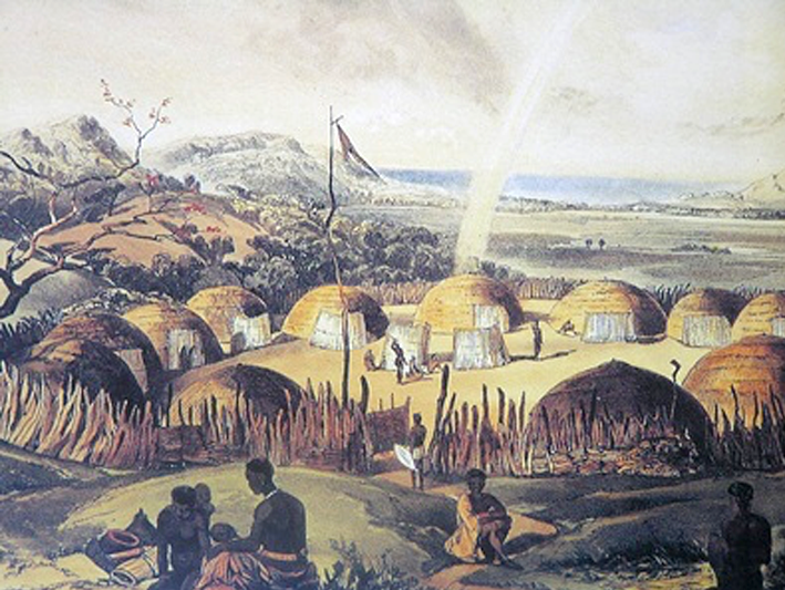 A watercolor of a kraal of huts and a stockade around them, nestled amongst hills with a deep background that ends in a ridge.