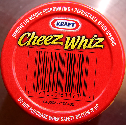 Close-up of a lid of Kraft's Cheez Whiz