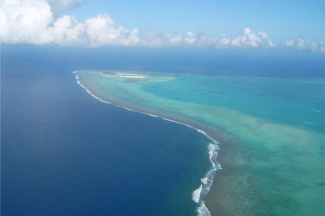 An aerial view of the islet Motu Maina in the southwest corner of Aitutakis lagoon in the Cook Islands.