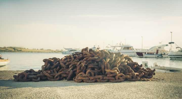 A huge pile of rusty chain at the harbor