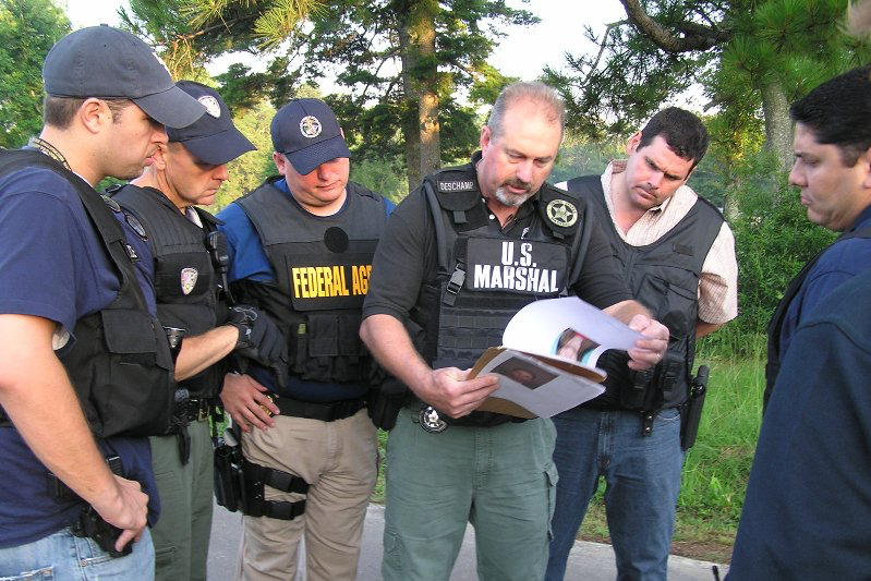 United States Marshals are briefed for Operation Falcon 2008.