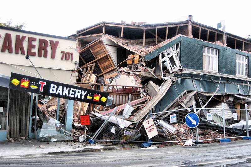 Shops, already damaged in the September 4th quake, suffer structural failure during February 22 aftershock. T Bakery at 701 Gloucester Street, Linwood, Christchurch.