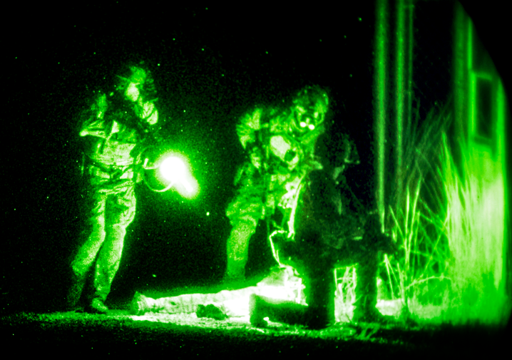 Two soldiers as seen through night-vision goggles