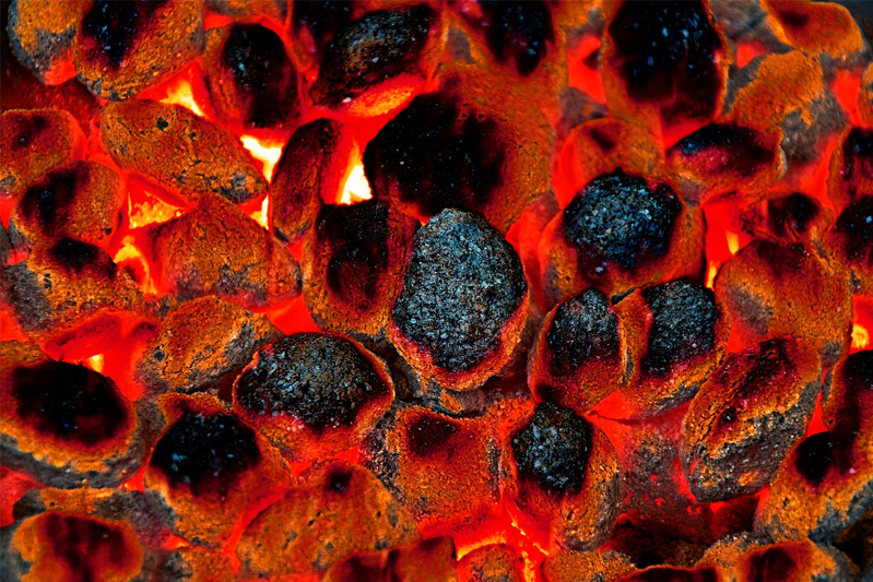 A close-up of hot briquettes
