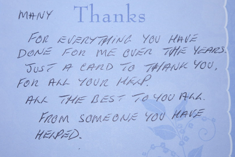 A thank you note written on a blue background.