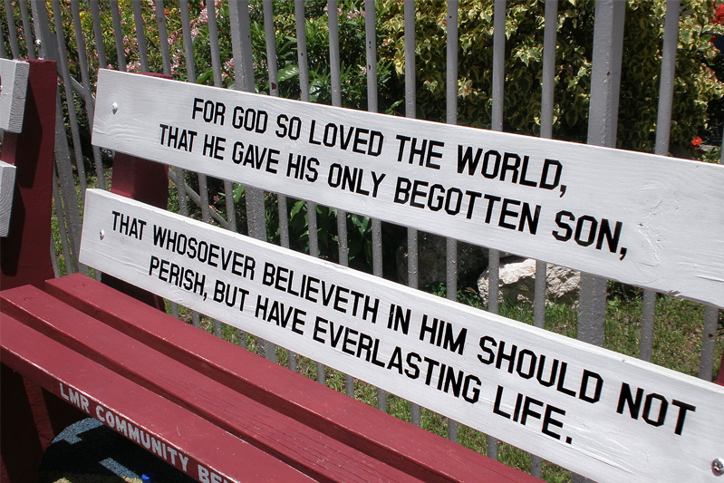 Biblical quote...that whosoever believeth in him, should not perish, but have everlasting life…on a park bench in Antigua